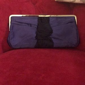 Purple and black envelope clutch